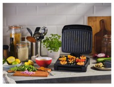 Russell Hobbs George Foreman 28310-56/GF Immersa Grill Medium fekete kontaktgrill Konyhai termékek - Konyhai kisgép (sütés / főzés / hűtés / ételkészítés) - Kontakt grill sütő / sütőlap - 497845