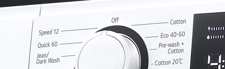A mosógép programválasztó gombjának közelnézeti képe.